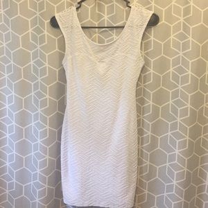 Mini skin tight white dress